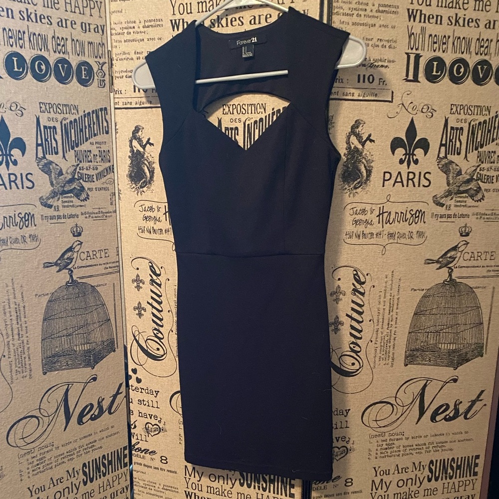 Form-fitting black dress